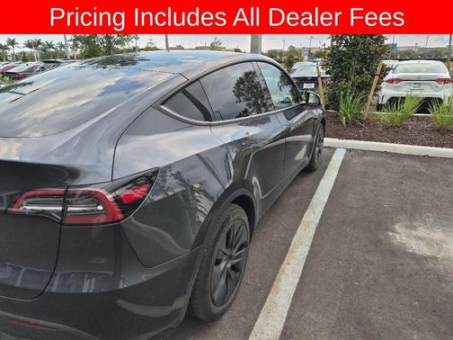 Solid Black 2025 Tesla Model Y Long Range Dual Motor Rear-Wheel Drive