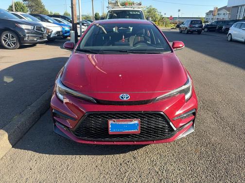 Ruby Flare Pearl 2023 Toyota Corolla Hybrid SE