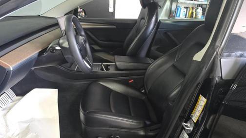 Solid Black 2023 Tesla Model 3 Performance
