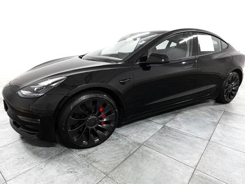 Solid Black 2023 Tesla Model 3 Performance