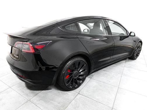 Solid Black 2023 Tesla Model 3 Performance