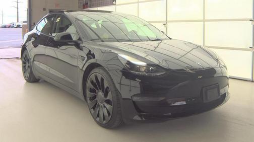 Solid Black 2023 Tesla Model 3 Performance