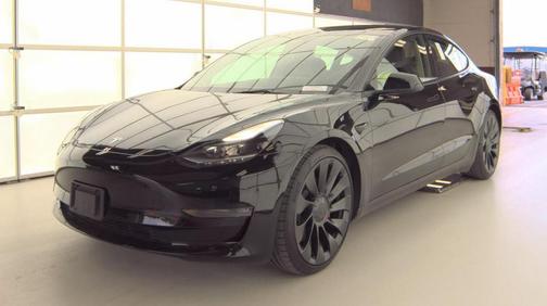 Solid Black 2023 Tesla Model 3 Performance