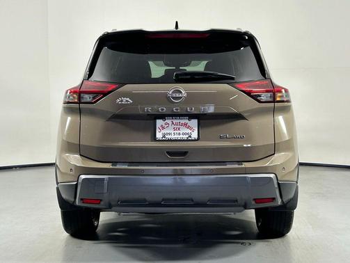Baja Storm Metallic/Super Black 2024 Nissan Rogue SL
