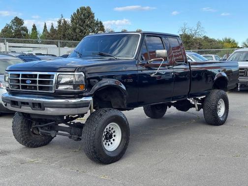 Black 1995 Ford F-250 XLT SuperCab H/D