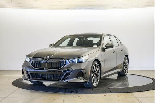 Gray 2026 BMW 550e xDrive