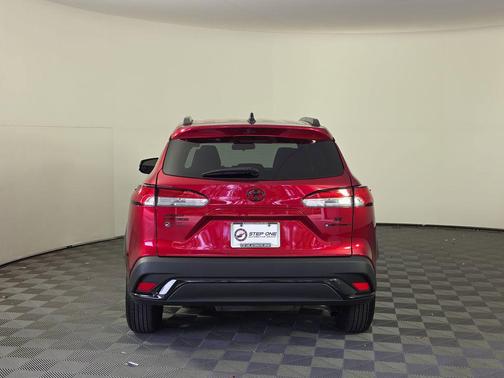 Soul Red Crystal/Jet Black 2025 Toyota Corolla Hybrid SE