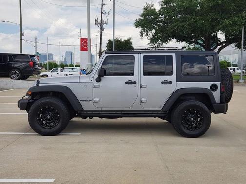 Silver 2014 Jeep Wrangler Unlimited Sport