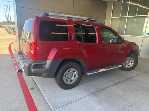 Red 2010 Nissan Xterra X
