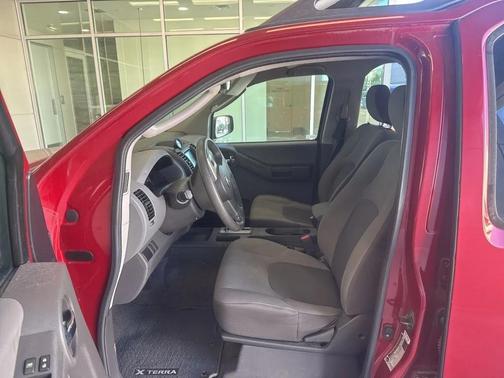 Red 2010 Nissan Xterra X
