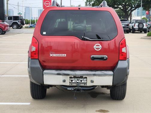 Red 2010 Nissan Xterra X