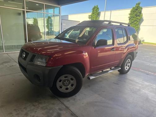 Red 2010 Nissan Xterra X