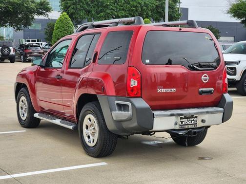 Red 2010 Nissan Xterra X