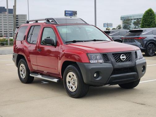 Red 2010 Nissan Xterra X