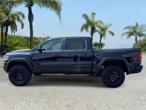 Diamond Black Crystal Pearlcoat 2026 RAM 1500 RHO Crew Cab 4x4 5'7' Box