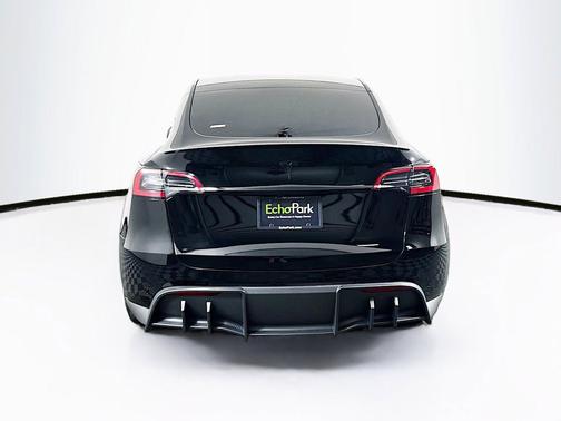 Solid Black 2025 Tesla Model Y Performance Dual Motor All-Wheel Drive