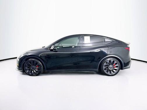 Solid Black 2025 Tesla Model Y Performance