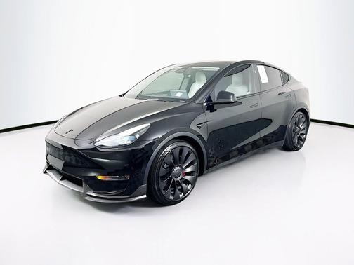 Solid Black 2025 Tesla Model Y Performance