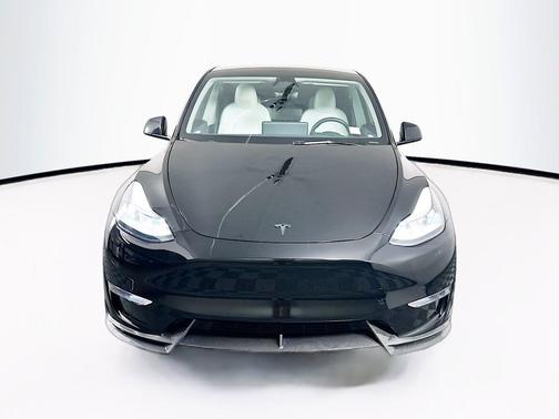 Solid Black 2025 Tesla Model Y Performance