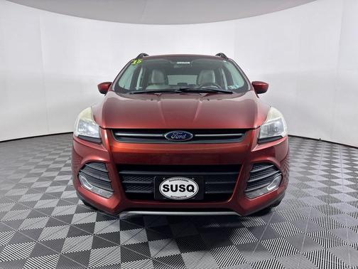 Orange 2015 Ford Escape SE
