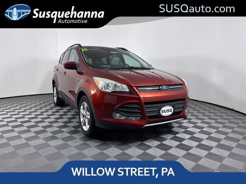 Orange 2015 Ford Escape SE