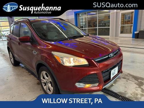 Orange 2015 Ford Escape SE