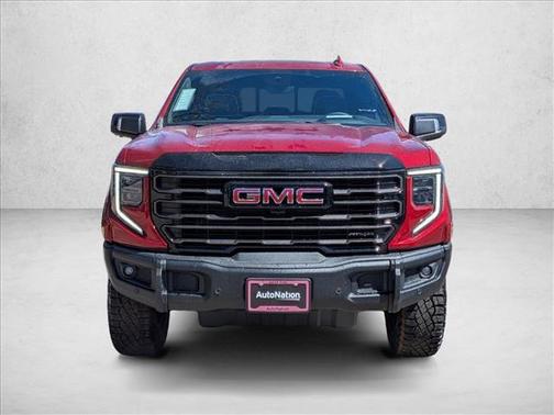 Volcanic Red Tintcoat 2026 GMC Sierra 1500 AT4X