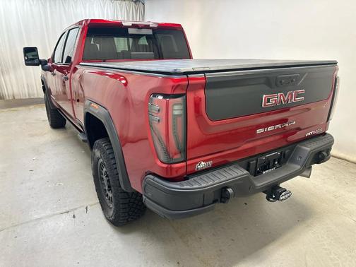 Volcanic Red 2025 GMC Sierra 2500 AT4X