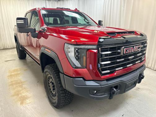 Volcanic Red 2025 GMC Sierra 2500 AT4X