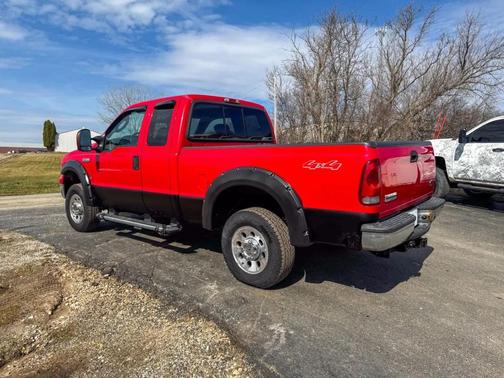 Red 2005 Ford F-250 Lariat
