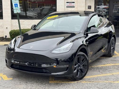 Solid Black 2025 Tesla Model Y Long Range Dual Motor Rear-Wheel Drive