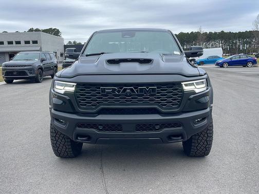 Diamond Black Crystal Pearlcoat 2026 RAM 1500 RHO Crew Cab 4x4 5'7' Box