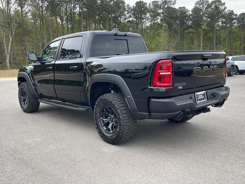 Diamond Black Crystal Pearlcoat 2026 RAM 1500 RHO Crew Cab 4x4 5'7' Box