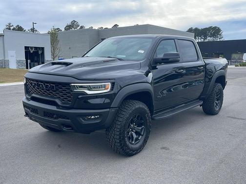 Diamond Black Crystal Pearlcoat 2026 RAM 1500 RHO Crew Cab 4x4 5'7' Box