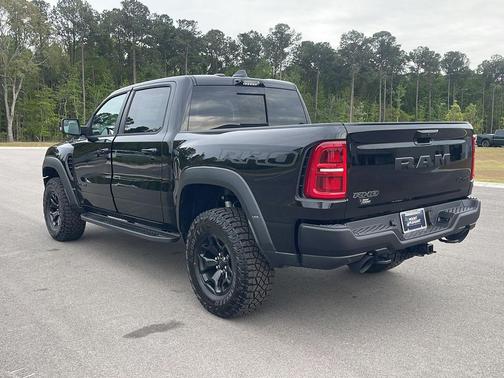 Diamond Black Crystal Pearlcoat 2026 RAM 1500 RHO Crew Cab 4x4 5'7' Box