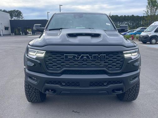 Diamond Black Crystal Pearlcoat 2026 RAM 1500 RHO Crew Cab 4x4 5'7' Box