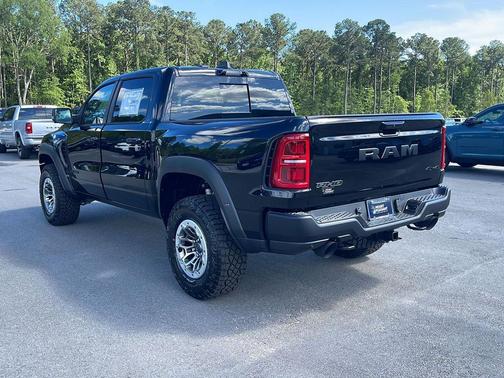 Diamond Black Crystal Pearlcoat 2026 RAM 1500 RHO Crew Cab 4x4 5'7' Box
