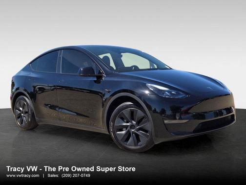 Solid Black 2025 Tesla Model Y Long Range Dual Motor All-Wheel Drive