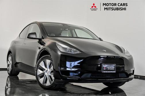 Solid Black 2024 Tesla Model Y Long Range Dual Motor All-Wheel Drive