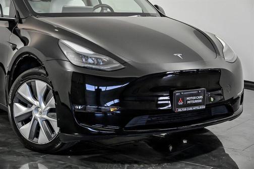 Solid Black 2024 Tesla Model Y Long Range Dual Motor All-Wheel Drive