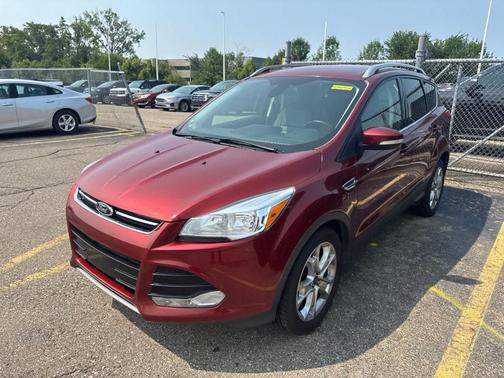 Sunset 2015 Ford Escape Titanium