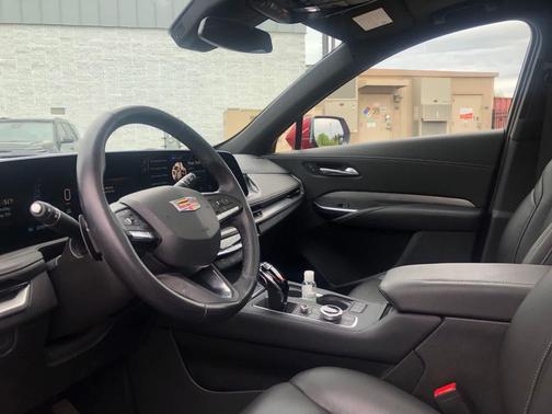 Radiant Red Tintcoat 2024 Cadillac XT4 Premium Luxury