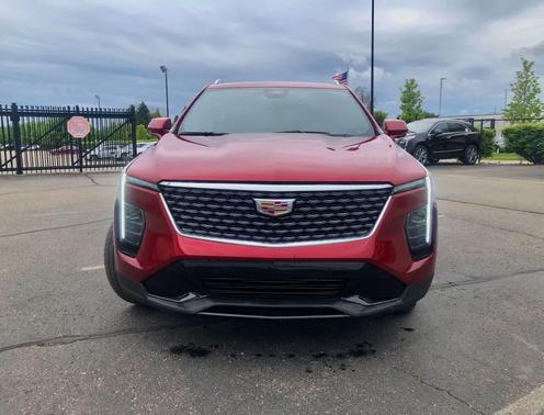 Radiant Red Tintcoat 2024 Cadillac XT4 Premium Luxury