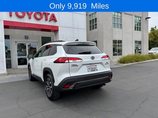 Wind Chill Pearl 2025 Toyota Corolla Hybrid SE