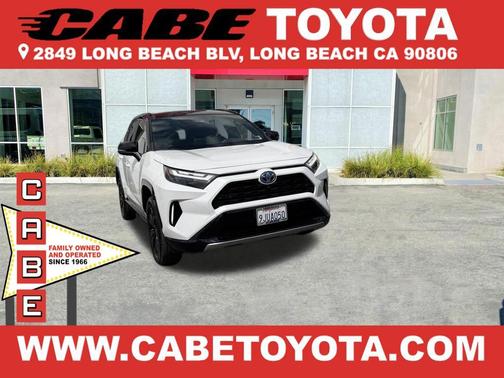 Wind Chill Pearl/Midnight Black Metallic 2023 Toyota RAV4 Hybrid SE