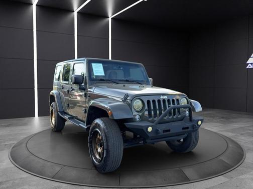 Green 2015 Jeep Wrangler Unlimited Sahara