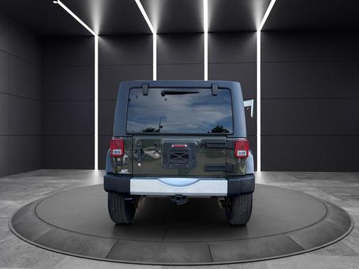 Green 2015 Jeep Wrangler Unlimited Sahara
