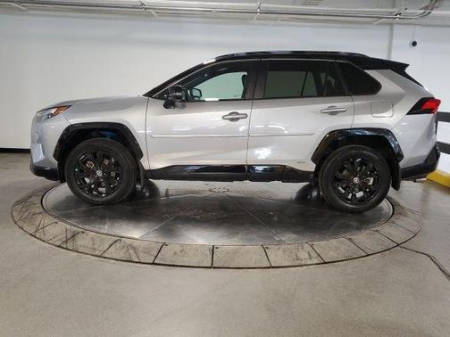 Silver Sky Metallic/Midnight Black Metallic 2023 Toyota RAV4 Hybrid SE