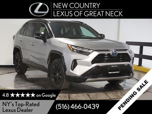 Silver Sky Metallic/Midnight Black Metallic 2023 Toyota RAV4 Hybrid SE