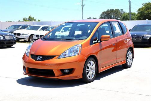 Orange Revolution Metallic 2010 Honda Fit Sport